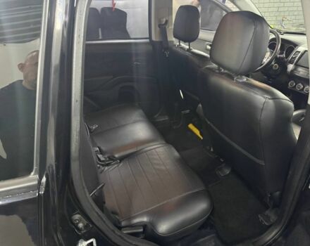 Черный Мицубиси Аутлендер, объемом двигателя 2.4 л и пробегом 305 тыс. км за 10000 $, фото 6 на Automoto.ua