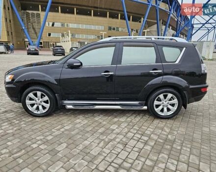 Чорний Міцубісі Аутлендер, об'ємом двигуна 2.4 л та пробігом 70 тис. км за 13000 $, фото 1 на Automoto.ua