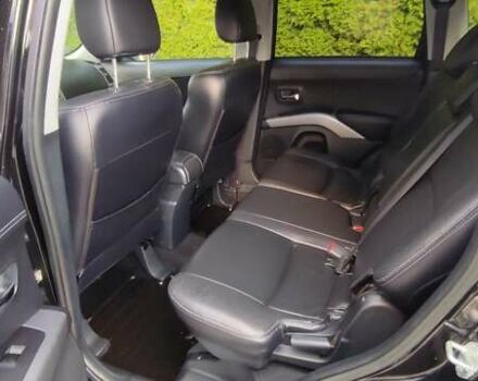 Черный Мицубиси Аутлендер, объемом двигателя 2 л и пробегом 210 тыс. км за 10600 $, фото 12 на Automoto.ua