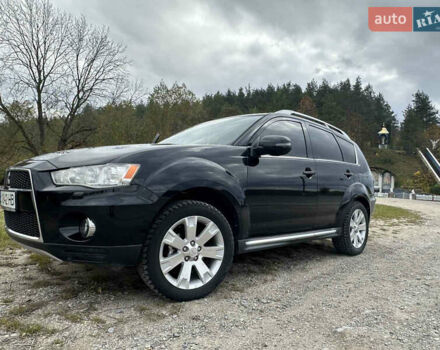 Черный Мицубиси Аутлендер, объемом двигателя 1.97 л и пробегом 224 тыс. км за 9000 $, фото 2 на Automoto.ua