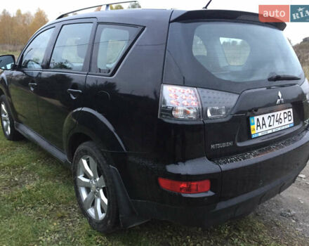 Черный Мицубиси Аутлендер, объемом двигателя 2.36 л и пробегом 315 тыс. км за 9700 $, фото 7 на Automoto.ua