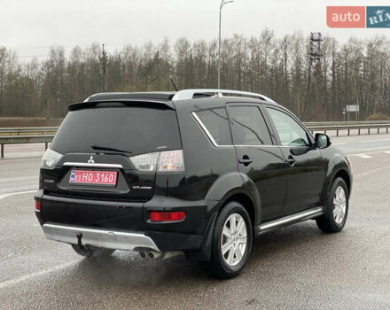 Черный Мицубиси Аутлендер, объемом двигателя 2.2 л и пробегом 227 тыс. км за 10700 $, фото 3 на Automoto.ua