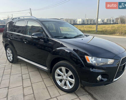 Чорний Міцубісі Аутлендер, об'ємом двигуна 2.36 л та пробігом 244 тис. км за 9850 $, фото 15 на Automoto.ua