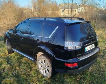 Черный Мицубиси Аутлендер, объемом двигателя 2 л и пробегом 261 тыс. км за 9700 $, фото 12 на Automoto.ua