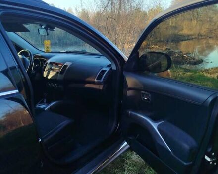 Черный Мицубиси Аутлендер, объемом двигателя 2 л и пробегом 261 тыс. км за 9700 $, фото 17 на Automoto.ua