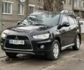 Черный Мицубиси Аутлендер, объемом двигателя 2.4 л и пробегом 197 тыс. км за 11300 $, фото 1 на Automoto.ua
