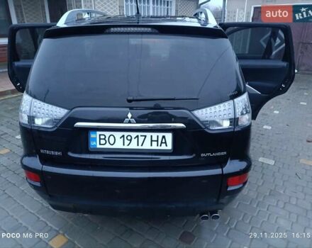Черный Мицубиси Аутлендер, объемом двигателя 2.2 л и пробегом 225 тыс. км за 11500 $, фото 1 на Automoto.ua
