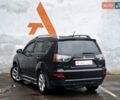 Черный Мицубиси Аутлендер, объемом двигателя 2.36 л и пробегом 107 тыс. км за 13990 $, фото 18 на Automoto.ua