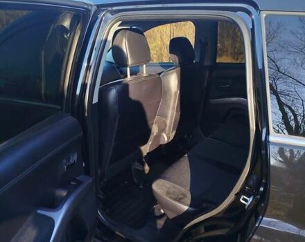 Черный Мицубиси Аутлендер, объемом двигателя 2 л и пробегом 261 тыс. км за 9700 $, фото 18 на Automoto.ua