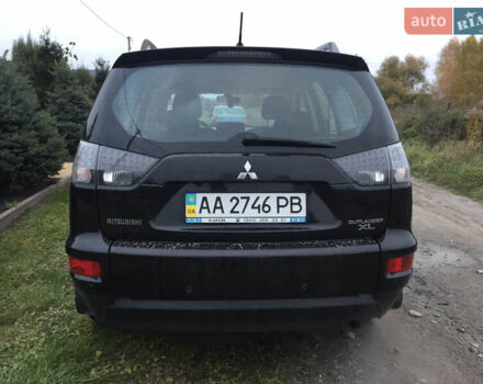 Черный Мицубиси Аутлендер, объемом двигателя 2.36 л и пробегом 315 тыс. км за 9700 $, фото 6 на Automoto.ua