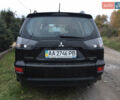 Черный Мицубиси Аутлендер, объемом двигателя 2.36 л и пробегом 315 тыс. км за 9700 $, фото 6 на Automoto.ua