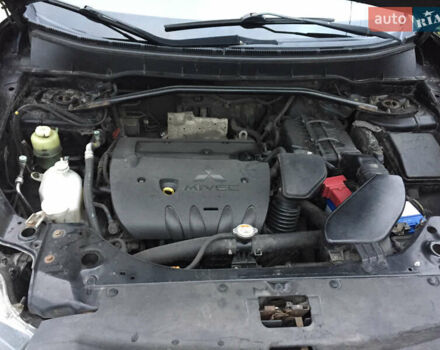 Черный Мицубиси Аутлендер, объемом двигателя 2.36 л и пробегом 315 тыс. км за 9700 $, фото 20 на Automoto.ua