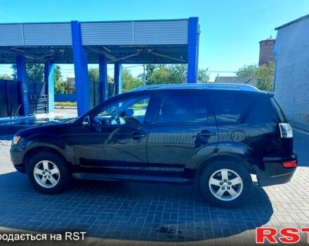 Чорний Міцубісі Аутлендер, об'ємом двигуна 2 л та пробігом 291 тис. км за 11200 $, фото 1 на Automoto.ua