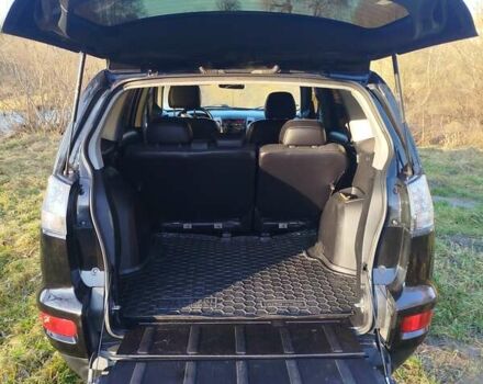 Черный Мицубиси Аутлендер, объемом двигателя 2 л и пробегом 261 тыс. км за 9700 $, фото 15 на Automoto.ua