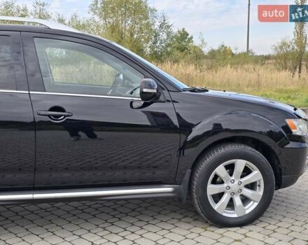 Мицубиси Аутлендер 2010 в Калуше на Automoto.ua Черный Мицубиси Аутлендер, объемом двигателя 1.97 л и пробегом 270 тыс. км за 11700 $, фото 16 на Automoto.ua