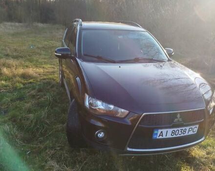 Черный Мицубиси Аутлендер, объемом двигателя 2 л и пробегом 261 тыс. км за 9700 $, фото 4 на Automoto.ua