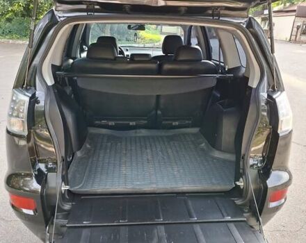 Мицубиси Аутлендер 2010 в Чернигове на Automoto.ua Черный Мицубиси Аутлендер, объемом двигателя 2.4 л и пробегом 180 тыс. км за 11500 $, фото 26 на Automoto.ua