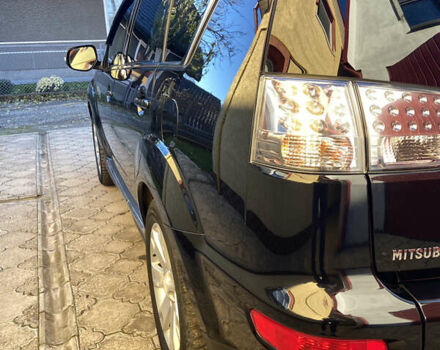 Черный Мицубиси Аутлендер, объемом двигателя 1.97 л и пробегом 292 тыс. км за 10900 $, фото 14 на Automoto.ua
