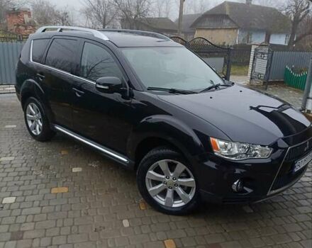 Черный Мицубиси Аутлендер, объемом двигателя 2.2 л и пробегом 225 тыс. км за 11500 $, фото 3 на Automoto.ua