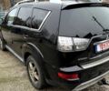 Черный Мицубиси Аутлендер, объемом двигателя 2 л и пробегом 300 тыс. км за 5500 $, фото 3 на Automoto.ua
