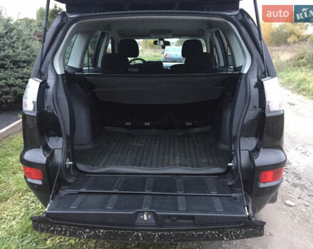 Черный Мицубиси Аутлендер, объемом двигателя 2.36 л и пробегом 315 тыс. км за 9700 $, фото 18 на Automoto.ua