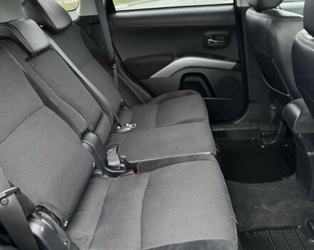 Чорний Міцубісі Аутлендер, об'ємом двигуна 2 л та пробігом 228 тис. км за 10550 $, фото 36 на Automoto.ua