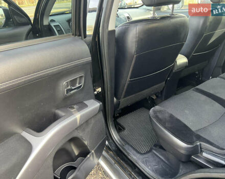 Черный Мицубиси Аутлендер, объемом двигателя 2.36 л и пробегом 244 тыс. км за 9850 $, фото 20 на Automoto.ua