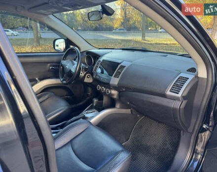 Черный Мицубиси Аутлендер, объемом двигателя 3 л и пробегом 162 тыс. км за 10800 $, фото 14 на Automoto.ua