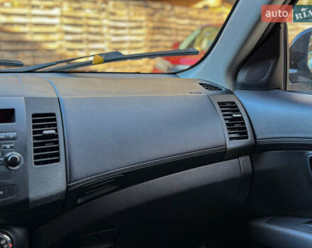 Черный Мицубиси Аутлендер, объемом двигателя 2.2 л и пробегом 226 тыс. км за 11500 $, фото 86 на Automoto.ua