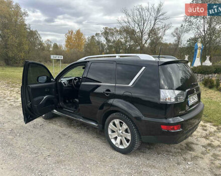 Черный Мицубиси Аутлендер, объемом двигателя 1.97 л и пробегом 224 тыс. км за 9000 $, фото 3 на Automoto.ua