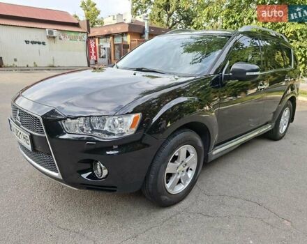 Мицубиси Аутлендер 2010 в Чернигове на Automoto.ua Черный Мицубиси Аутлендер, объемом двигателя 2.4 л и пробегом 180 тыс. км за 11500 $, фото 5 на Automoto.ua