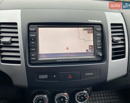 Черный Мицубиси Аутлендер, объемом двигателя 2.2 л и пробегом 227 тыс. км за 10700 $, фото 27 на Automoto.ua