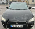 Черный Мицубиси Аутлендер, объемом двигателя 2.18 л и пробегом 253 тыс. км за 10999 $, фото 1 на Automoto.ua