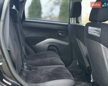 Черный Мицубиси Аутлендер, объемом двигателя 2.4 л и пробегом 184 тыс. км за 10800 $, фото 10 на Automoto.ua