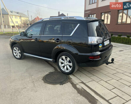 Чорний Міцубісі Аутлендер, об'ємом двигуна 2.36 л та пробігом 244 тис. км за 9850 $, фото 21 на Automoto.ua