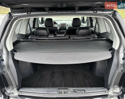 Чорний Міцубісі Аутлендер, об'ємом двигуна 2 л та пробігом 228 тис. км за 10550 $, фото 37 на Automoto.ua