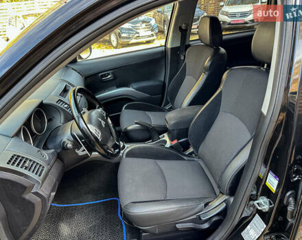 Черный Мицубиси Аутлендер, объемом двигателя 2.2 л и пробегом 226 тыс. км за 11500 $, фото 63 на Automoto.ua