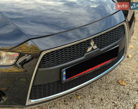 Черный Мицубиси Аутлендер, объемом двигателя 2.2 л и пробегом 226 тыс. км за 11500 $, фото 44 на Automoto.ua