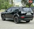 Черный Мицубиси Аутлендер, объемом двигателя 2 л и пробегом 220 тыс. км за 8900 $, фото 18 на Automoto.ua