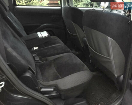 Черный Мицубиси Аутлендер, объемом двигателя 2.36 л и пробегом 315 тыс. км за 9700 $, фото 15 на Automoto.ua