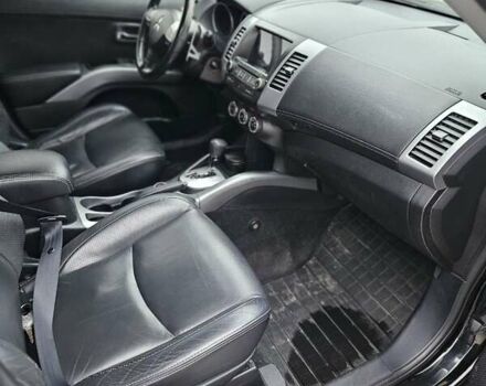 Чорний Міцубісі Аутлендер, об'ємом двигуна 2.4 л та пробігом 70 тис. км за 13000 $, фото 11 на Automoto.ua