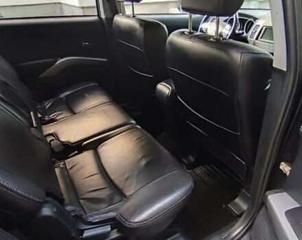 Черный Мицубиси Аутлендер, объемом двигателя 2 л и пробегом 210 тыс. км за 10600 $, фото 14 на Automoto.ua