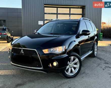 Черный Мицубиси Аутлендер, объемом двигателя 2.2 л и пробегом 263 тыс. км за 11300 $, фото 4 на Automoto.ua
