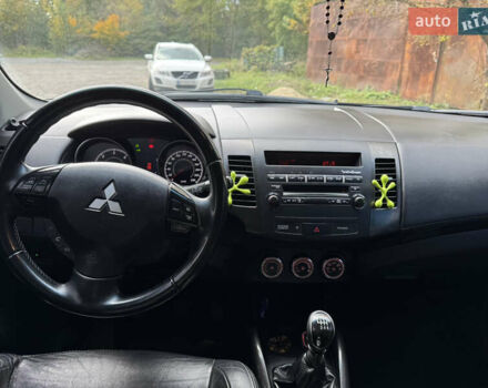 Чорний Міцубісі Аутлендер, об'ємом двигуна 2 л та пробігом 258 тис. км за 8699 $, фото 12 на Automoto.ua