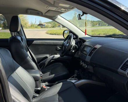 Чорний Міцубісі Аутлендер, об'ємом двигуна 2.36 л та пробігом 235 тис. км за 12500 $, фото 10 на Automoto.ua