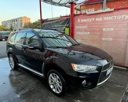 Черный Мицубиси Аутлендер, объемом двигателя 0 л и пробегом 215 тыс. км за 9500 $, фото 2 на Automoto.ua