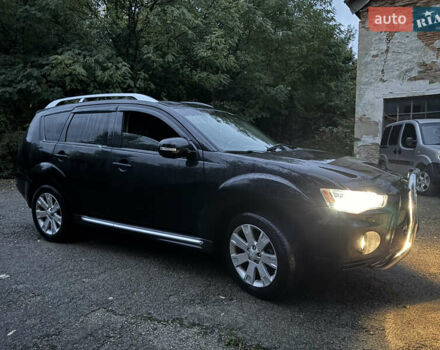 Чорний Міцубісі Аутлендер, об'ємом двигуна 2 л та пробігом 258 тис. км за 8699 $, фото 14 на Automoto.ua