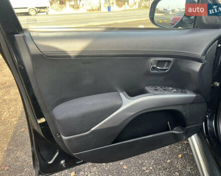 Чорний Міцубісі Аутлендер, об'ємом двигуна 2.36 л та пробігом 244 тис. км за 9850 $, фото 7 на Automoto.ua