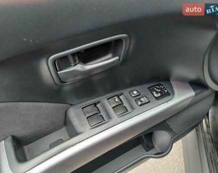 Чорний Міцубісі Аутлендер, об'ємом двигуна 2 л та пробігом 226 тис. км за 10750 $, фото 6 на Automoto.ua