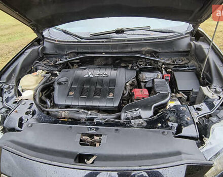 Черный Мицубиси Аутлендер, объемом двигателя 2.27 л и пробегом 238 тыс. км за 11500 $, фото 3 на Automoto.ua